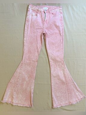 Pink acid wash flare jeans by LilyMae’s